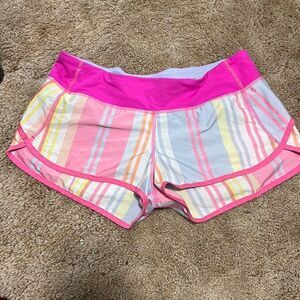 - Size 8 Lululemon groovy Stripe Speed Shorts